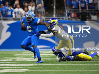 DETROIT,MICHIGAN-SEPTEMBER 8: Detroit Lions running back David Montgomery (5) runs the ball during overtime of an NFL football game between...