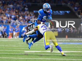 DETROIT,MICHIGAN-SEPTEMBER 8: Detroit Lions wide receiver Jameson Williams (9) is tackled by Los Angeles Rams safety Quentin Lake (37) durin...