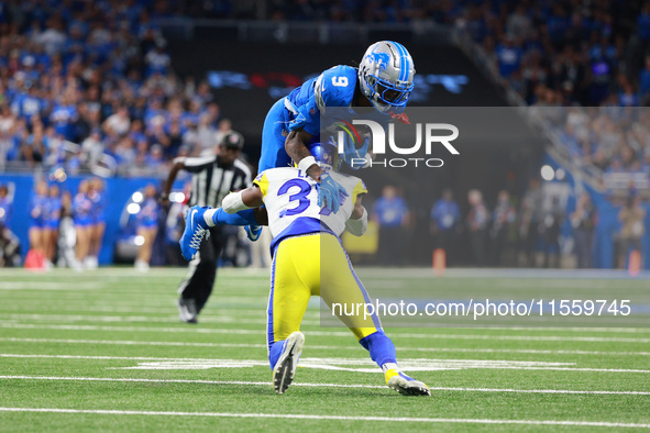 DETROIT,MICHIGAN-SEPTEMBER 8: Detroit Lions wide receiver Jameson Williams (9) is tackled by Los Angeles Rams safety Quentin Lake (37) durin...