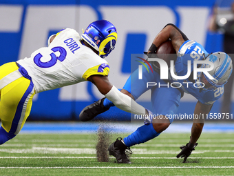 DETROIT,MICHIGAN-SEPTEMBER 8: 
Running back Jahmyr Gibbs (26) of the Detroit Lions is taken down by safety Kamren Curl (3) of the Los Angele...