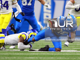 DETROIT,MICHIGAN-SEPTEMBER 8: 
Running back Jahmyr Gibbs (26) of the Detroit Lions is taken down by safety Kamren Curl (3) of the Los Angele...