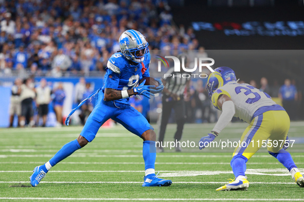 DETROIT,MICHIGAN-SEPTEMBER 8: Detroit Lions wide receiver Jameson Williams (9) runs the ball during the second half of an NFL football game...