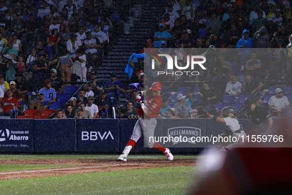 Julian Ornelas #31 of Diablos Rojos hits the ball during the 2024 King Series match 3 against Sultanes de Monterrey of the Mexican Baseball...