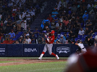 Julian Ornelas #31 of Diablos Rojos hits the ball during the 2024 King Series match 3 against Sultanes de Monterrey of the Mexican Baseball...