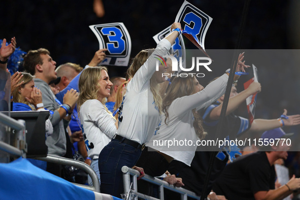 DETROIT,MICHIGAN-SEPTEMBER 8: Detroit Lions fans cheers during the second half of an NFL football game between the Los Angeles Rams and the...