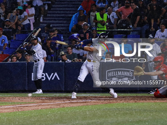 Carlos Soto #25 of Sultanes de Monterrey hits the ball during the 2024 King Series match 3 against Diablos Rojos of the Mexican Baseball Lea...