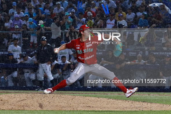 Trevor Bauer #96 of Diablos Rojos pitches the ball during the 2024 King Series match 3 against Sultanes de Monterrey of the Mexican Baseball...