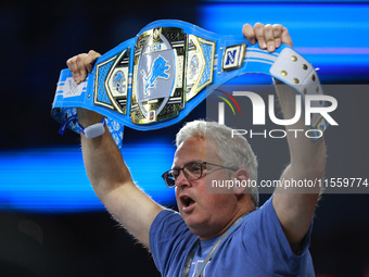 DETROIT,MICHIGAN-SEPTEMBER 8: Detroit Lions fan cheers during the second half of an NFL football game between the Los Angeles Rams and the D...