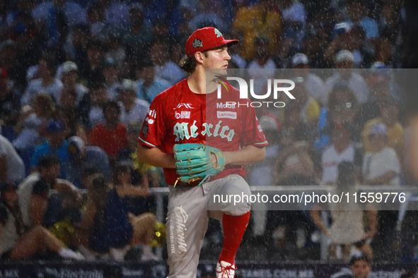 Trevor Bauer #96 of Diablos Rojos pitches the ball during the 2024 King Series match 3 against Sultanes de Monterrey of the Mexican Baseball...