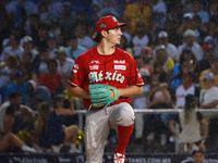 Trevor Bauer #96 of Diablos Rojos pitches the ball during the 2024 King Series match 3 against Sultanes de Monterrey of the Mexican Baseball...