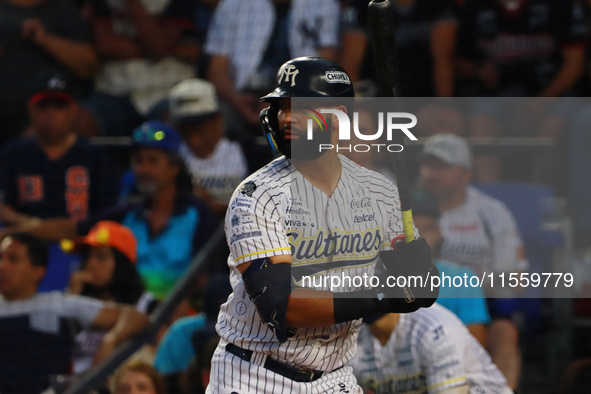 Nomar Mazara #15 of Sultanes de Monterrey bats during the 2024 King Series match 3 against Diablos Rojos of the Mexican Baseball League (LMB...