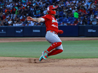 Juan Carlos Gamboa #47 of Diablos Rojos slides to the third base plate during the 2024 King Series match 3 against Sultanes de Monterrey of...