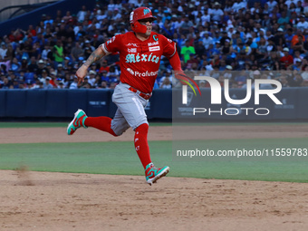 Juan Carlos Gamboa #47 of Diablos Rojos runs to third base during the 2024 King Series match 3 against Sultanes de Monterrey of the Mexican...