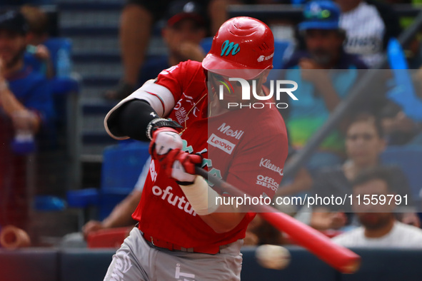 Julian Ornelas #31 of Diablos Rojos bats during the 2024 King Series match 3 against Sultanes de Monterrey of the Mexican Baseball League (L...