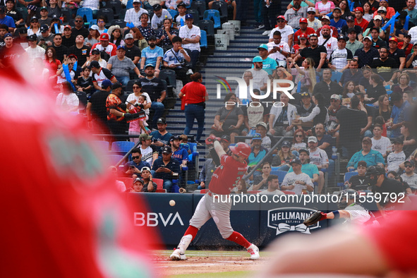 Julian Ornelas #31 of Diablos Rojos bats during the 2024 King Series match 3 against Sultanes de Monterrey of the Mexican Baseball League (L...