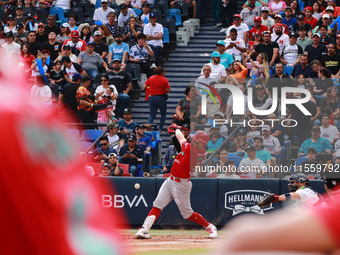 Julian Ornelas #31 of Diablos Rojos bats during the 2024 King Series match 3 against Sultanes de Monterrey of the Mexican Baseball League (L...