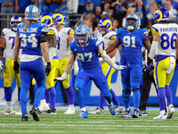 DETROIT,MICHIGAN-SEPTEMBER 8:  Defensive end Aidan Hutchinson (97) of the Detroit Lions celebrates a play during a game between the Detroit...