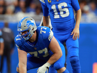 DETROIT,MICHIGAN-SEPTEMBER 8: Quarterback Jared Goff (16) of the Detroit Lions prepares to receive the snap from center Frank Ragnow (77) of...