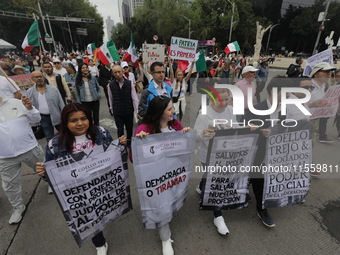 Demonstrators take part in the rally 'Great March for Mexican Democracy' against Mexican President Andres Manuel Lopez Obrador's controversi...