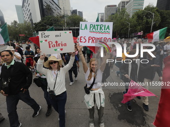 Demonstrators take part in the rally 'Great March for Mexican Democracy' against Mexican President Andres Manuel Lopez Obrador's controversi...