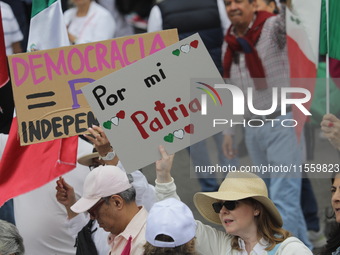 Demonstrators take part in the rally 'Great March for Mexican Democracy' against Mexican President Andres Manuel Lopez Obrador's controversi...