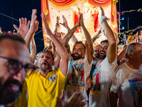 Sailors celebrate in front of the statue of Our Lady of Martyrs on the occasion of the patronal feast day in Molfetta, Italy, on September 8...