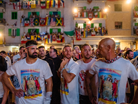 Sailors stand in front of the statue of Our Lady of Martyrs on the occasion of the patronal feast day in Molfetta, Italy, on September 8, 20...