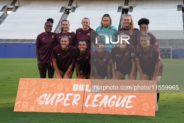 The Dallas Trinity FC soccer team poses for photos before the start of the USL Super League match between Dallas Trinity FC and DC Power FC...