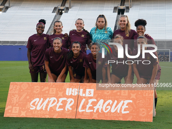 The Dallas Trinity FC soccer team poses for photos before the start of the USL Super League match between Dallas Trinity FC and DC Power FC...