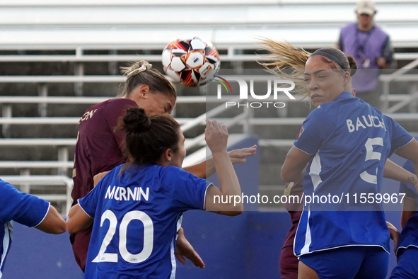 Hailey Davidson #11 of Dallas Trinity FC heads the ball during the USL Super League match between Dallas Trinity FC and DC Power FC at the C...