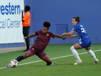 Enzi Broussard #7 of Dallas Trinity FC slides to the ball during the USL Super League match between Dallas Trinity FC and DC Power FC at the...