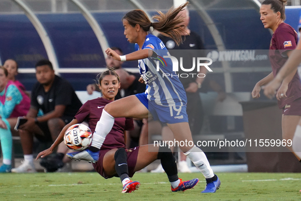 Yuuka Kurosaki #19 of DC Power FC drives the ball forward during the USL Super League match between Dallas Trinity FC and DC Power FC at the...