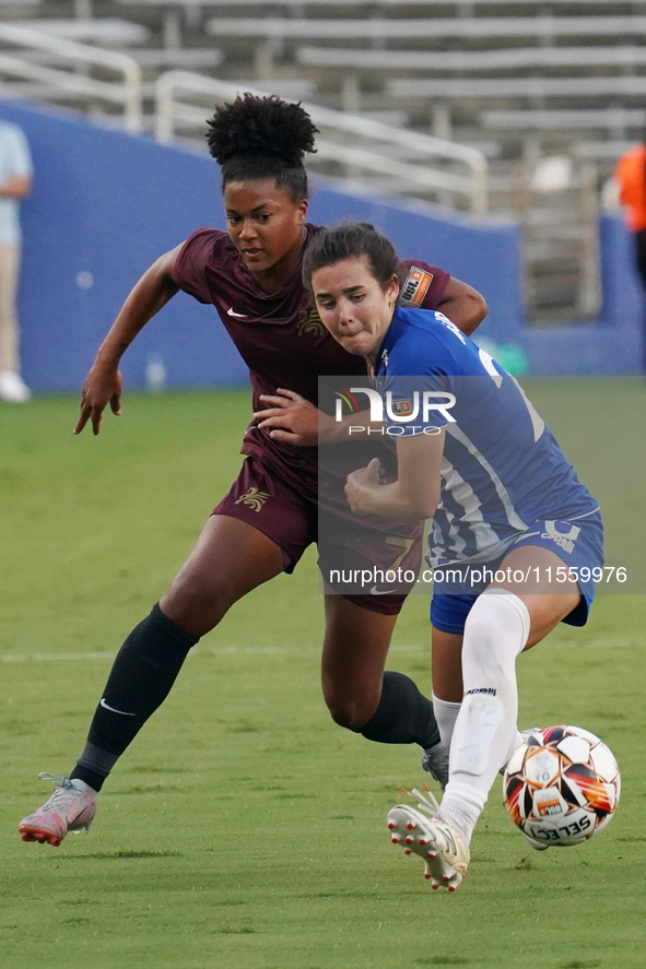 Enzi Broussard #7 of Dallas Trinity FC and Madison Murnin #20 battle for the ball during the USL Super League match between Dallas Trinity F...