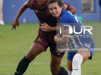 Enzi Broussard #7 of Dallas Trinity FC and Madison Murnin #20 battle for the ball during the USL Super League match between Dallas Trinity F...