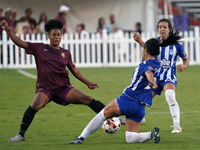 Enzi Broussard #7 of Dallas Trinity FC and Amber Diorio #24 slide to the ball during the USL Super League match between Dallas Trinity FC an...