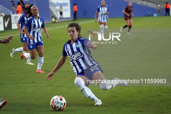 Madison Murnin #20 slides for the ball during the USL Super League match between Dallas Trinity FC and DC Power FC at the Cotton Bowl in Dal...