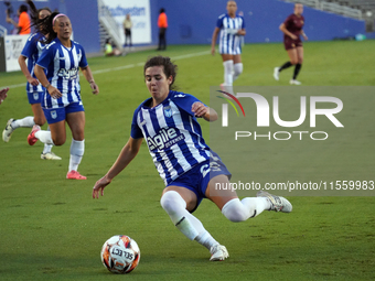 Madison Murnin #20 slides for the ball during the USL Super League match between Dallas Trinity FC and DC Power FC at the Cotton Bowl in Dal...