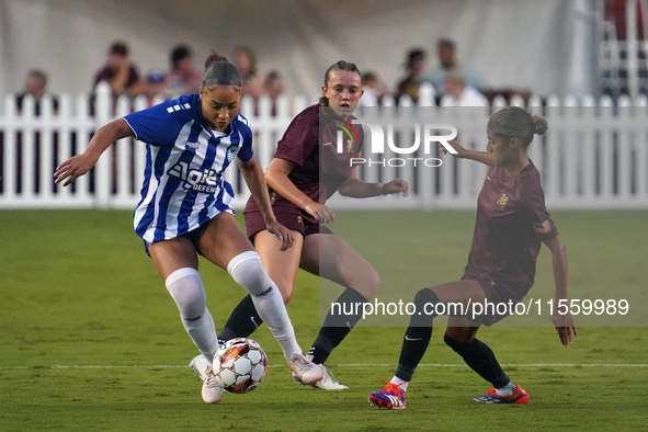 Jorian Baucom #5 drives the ball forward during the USL Super League match between Dallas Trinity FC and DC Power FC at the Cotton Bowl in D...