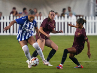 Jorian Baucom #5 drives the ball forward during the USL Super League match between Dallas Trinity FC and DC Power FC at the Cotton Bowl in D...