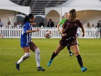 Allie Thornton #20 of Dallas Trinity FC and Amber Diorio #24 of DC Power FC battle for the ball during the USL Super League match between Da...