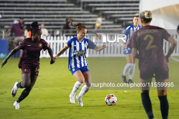 Susanna Friedrichs #3 of the DC Power FC drives the ball forward during the USL Super League match between Dallas Trinity FC and DC Power FC...