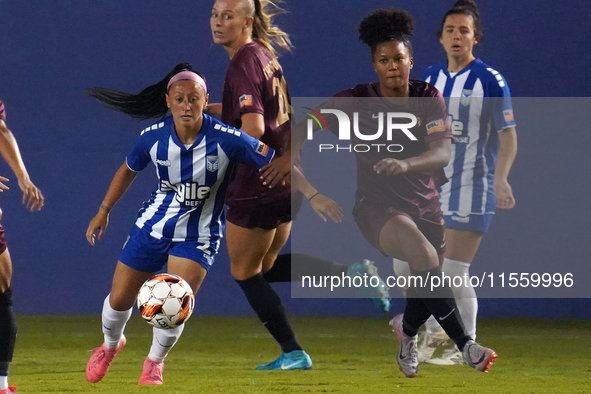 Katrina Guillou #21 of DC Power FC drives the ball forward against Enzi Broussard #7 of Dallas Trinity FC during the USL Super League match...