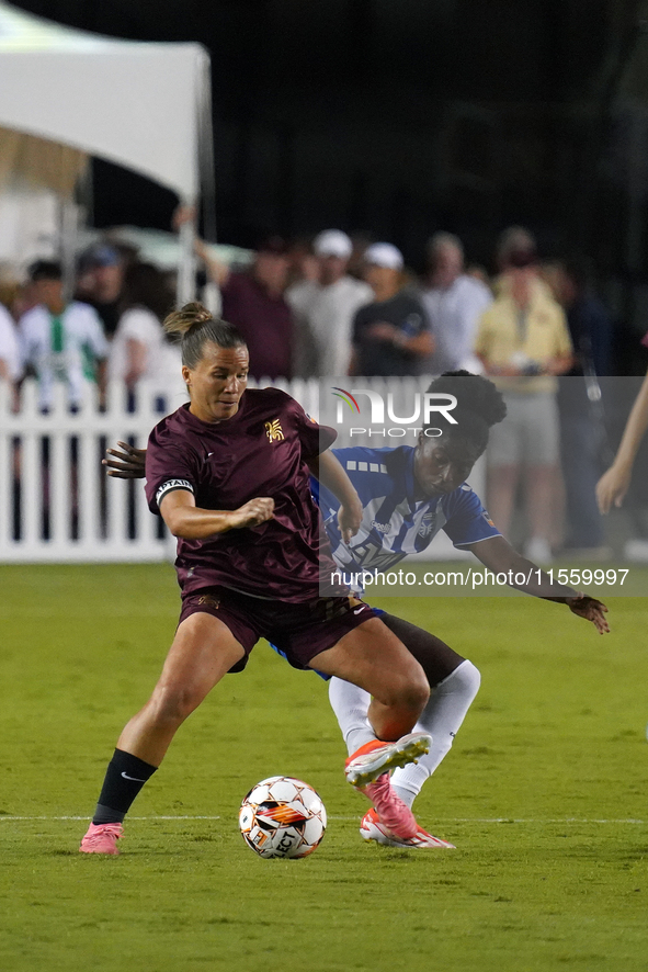 Amber Brooks #22 of Dallas Trinity FC battles for the ball during the USL Super League match between Dallas Trinity FC and DC Power FC at th...