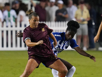 Amber Brooks #22 of Dallas Trinity FC battles for the ball during the USL Super League match between Dallas Trinity FC and DC Power FC at th...