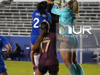 Goalkeeper Samantha Estrada #0 of Dallas Trinity FC punches the ball during the USL Super League match between Dallas Trinity FC and DC Powe...