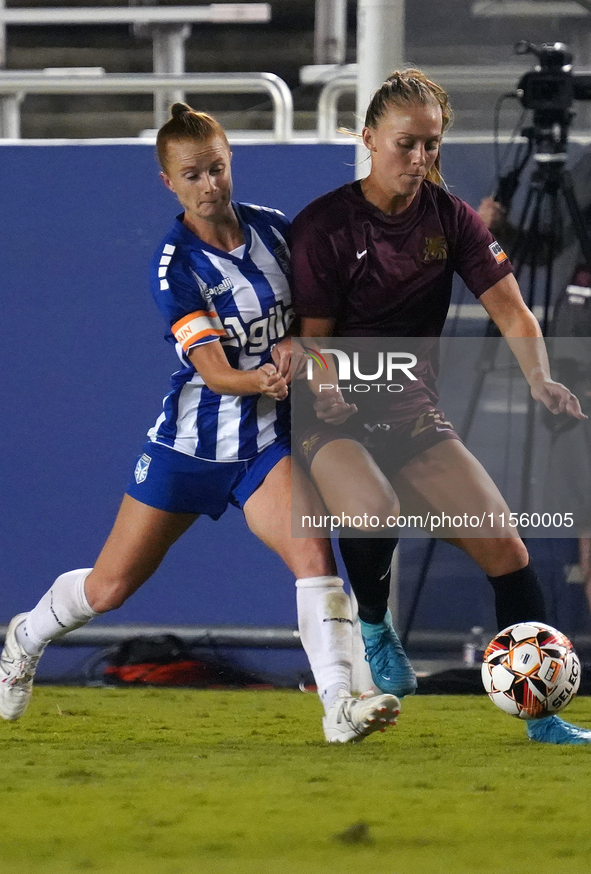 Allie Thornton #20 of Dallas Trinity FC and Susanna Friedrichs #3 of DC Power FC battle for the ball during the USL Super League match betwe...