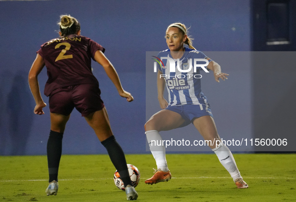 Charlie Estcourt #17 of DC Power FC drives the ball forward against Hannah Davison #2 of Dallas Trinity FC during the USL Super League match...