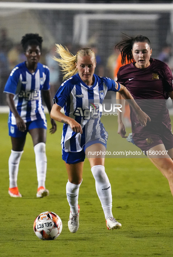 Anna Bagley #2 drives the ball forward during the USL Super League match between Dallas Trinity FC and DC Power FC at the Cotton Bowl in Dal...