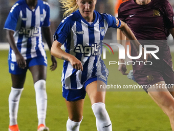 Anna Bagley #2 drives the ball forward during the USL Super League match between Dallas Trinity FC and DC Power FC at the Cotton Bowl in Dal...