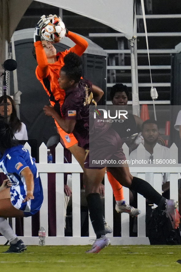 Goalkeeper Morgan Aquino #1 of DC Power FC catches the ball during the USL Super League match between Dallas Trinity FC and DC Power FC at t...